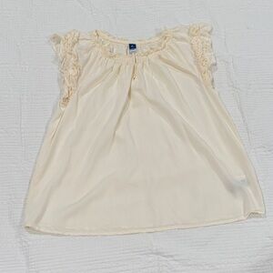 Cream Ruffled Sleeveless Blouse